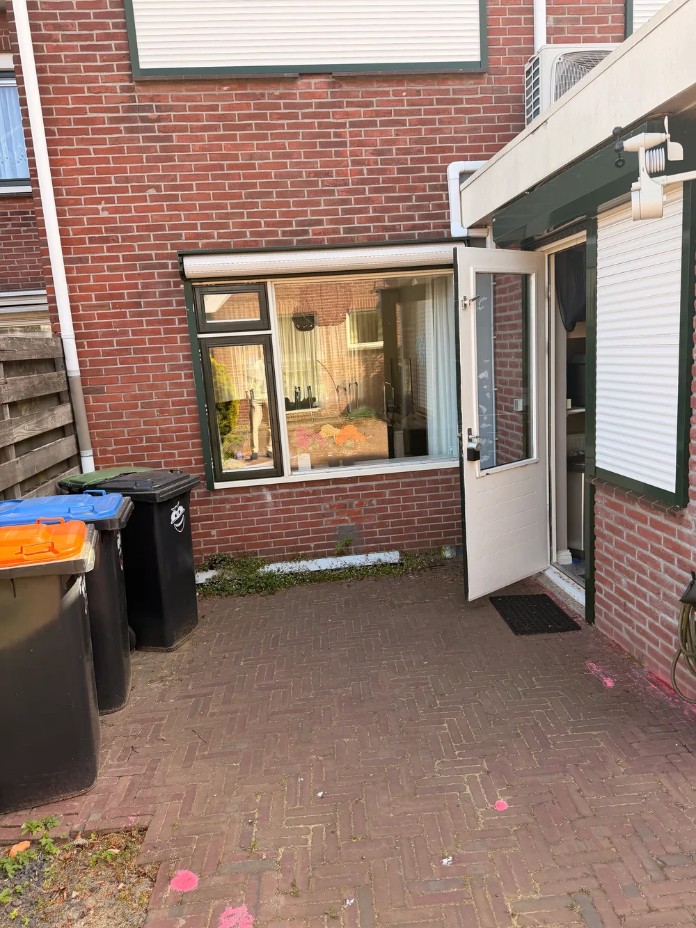 De achterdeur vóór de vernieuwing